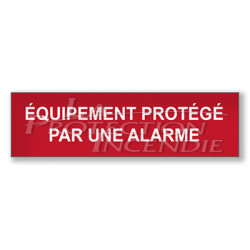 Red sign “EQUIPMENT PROTECTED BY AN ALARM”